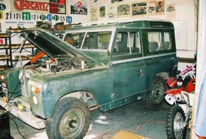 The Dalai Lama's Land Rover in the shop. From atlasobscura.com
